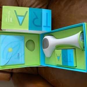 New in box never used.  TRIA BEAUTY
Tria Beauty Hair Removal Laser 4X -Green